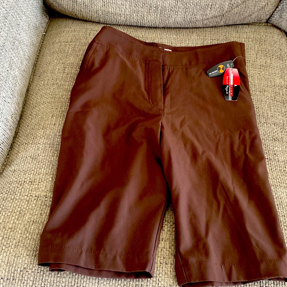 Bermuda length Performance shorts.